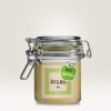 Pote de vidro com fecho hermético com mousse de maçã. Etiqueta adesiva personalizada com indicação do produto