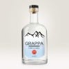Garrafa de vidro transparente para álcool. Etiqueta adesiva personalizada com indicação do produto: grappa